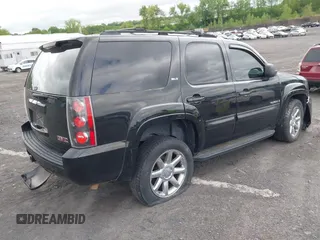 2007 GMC Yukon SLT z VIN 1GKFK13057R336128, wystawiony jako IAAI lot #42301778 z przebiegiem 153 227 mil mil oraz . Historia ofert i sprzedaży dostępna na DreamBid. Obrazek 4.
