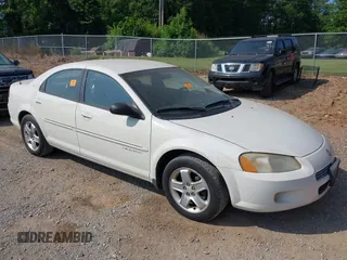 2001 Dodge Stratus z VIN 1B3EJ56U81N691181, wystawiony jako IAAI lot #42466657 z przebiegiem 140 236 mil mil oraz . Historia ofert i sprzedaży dostępna na DreamBid. Obrazek 6.