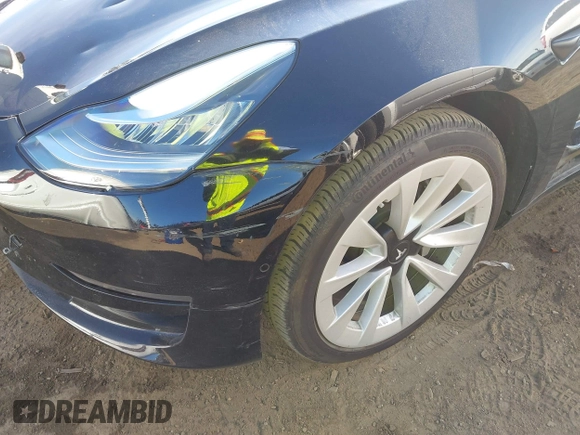 2022 Tesla Model 3 with VIN 5YJ3E1EA9NF295890, listed as a IAAI auction lot 41175917 with 42,230 mi miles and . Bid and sale history available at DreamBid. Image 23.