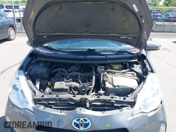 2013 Toyota Prius One with VIN JTDKDTB39D1546463, listed as a IAAI auction lot 42204559 with 142,006 mi miles. Bid and sale history available at carsss.com. Image 10.