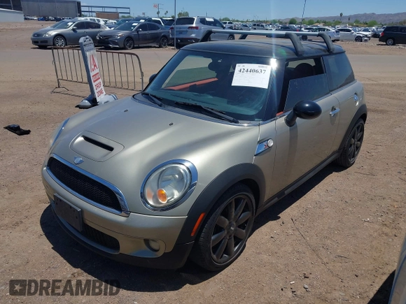 2010 MINI Hardtop S with VIN WMWMF7C50ATZ71187, listed as a IAAI auction lot 42440637 with 82,595 mi miles and . Bid and sale history available at DreamBid. Image 2.