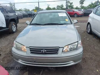 2001 Toyota Camry CE z VIN JT2BG22K410587070, wystawiony jako IAAI lot #42388043 z przebiegiem 119 183 mil mil oraz . Historia ofert i sprzedaży dostępna na DreamBid. Obrazek 13.