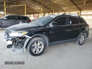 2015 Mazda CX-9 Touring with VIN JM3TB2CV1F0457586, listed as a Copart auction lot 63646475 with 125,509 mi miles and Clean title. Bid and sale history available at DreamBid. Image 1.