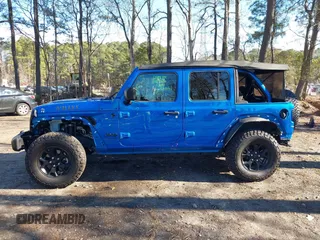 2021 Jeep Wrangler Unlimited Sport S with VIN 1C4HJXDG1MW722743, listed as a IAAI auction lot 41237900 with 35,662 mi miles and . Bid and sale history available at DreamBid. Image 14.