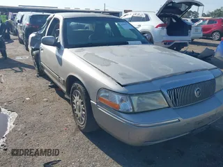 2004 Mercury Grand Marquis GS with VIN 2MEFM74W34X677247, listed as a IAAI auction lot 41856970 with 135,225 mi miles and . Bid and sale history available at DreamBid. Image 1.