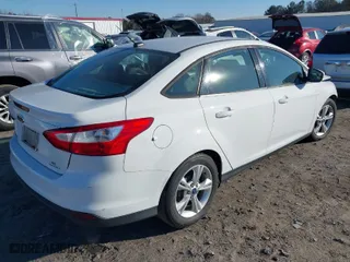 2014 Ford Focus SE with VIN 1FADP3F27EL215930, listed as a IAAI auction lot 41282263 with 130,324 mi miles. Bid and sale history available at carsss.com. Image 4.