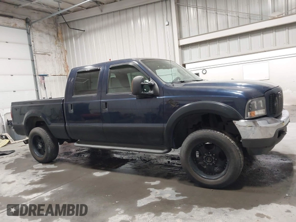 2003 Ford F-350 XL z VIN 1FTSW31P23EC99227, wystawiony jako IAAI lot #41949240 z przebiegiem 157 357 mil mil oraz . Historia ofert i sprzedaży dostępna na DreamBid. Obrazek 13.