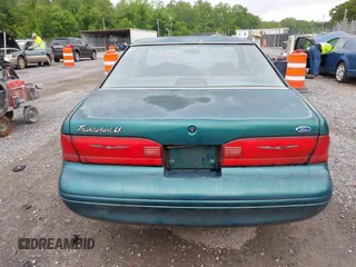 1996 Ford Thunderbird LX z VIN 1FALP62W9TH118637, wystawiony jako IAAI lot #42311641 z przebiegiem 96 361 mil mil oraz . Historia ofert i sprzedaży dostępna na DreamBid. Obrazek 16.