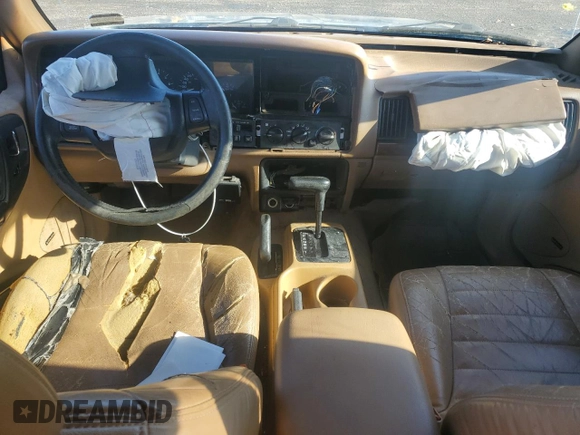 1998 Jeep Grand Cherokee Laredo with VIN 1J4GZ48S4WC239246, listed as a Copart auction lot 86101204 with 0 mi miles and Salvage Title. Bid and sale history available at carsss.com. Image 8.