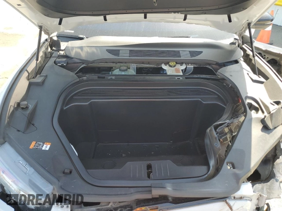 2022 Ford Mustang Mach-E Premium с VIN 3FMTK3R76NMA30130, выставлен на аукционе Copart как лот 58601735 с пробегом 76 466 миль миль и Списание • Salvage title. История ставок и продаж доступна на DreamBid. Изображение 12.