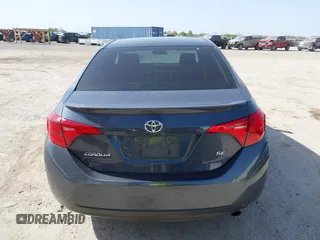 2019 Toyota Corolla L with VIN 5YFBURHE9KP910059, listed as a IAAI auction lot 41856905 with 104,096 mi miles and . Bid and sale history available at DreamBid. Image 16.