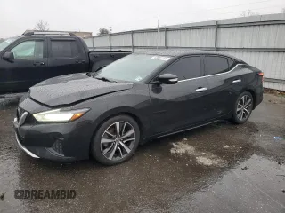 2019 Nissan Maxima Platinum z VIN 1N4AA6AV4KC378506, wystawiony jako Copart lot #43681155 z przebiegiem 148 568 mil mil oraz Szkody całkowita. Historia ofert i sprzedaży dostępna na DreamBid. Obrazek 1.