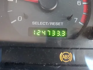 2004 Ford Mustang Deluxe with VIN 1FAFP44694F219365, listed as a IAAI auction lot 41628448 with 124,733 mi miles. Bid and sale history available at carsss.com. Image 16.