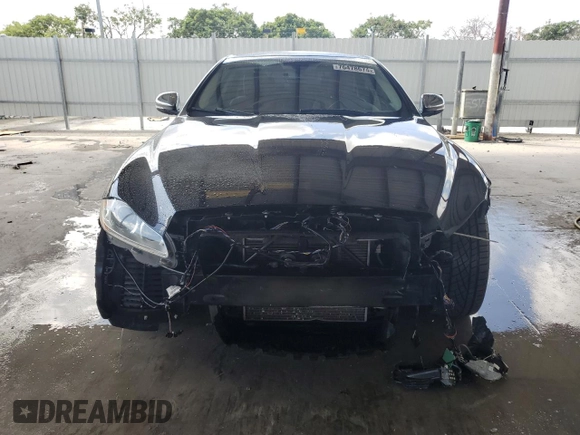 2014 Jaguar XJ Portfolio z VIN SAJWA2GZ4E8V60864, wystawiony jako Copart lot #76478674 z przebiegiem 50 578 mil mil oraz Szkoda całkowita • Salvage title. Historia ofert i sprzedaży dostępna na DreamBid. Obrazek 5.
