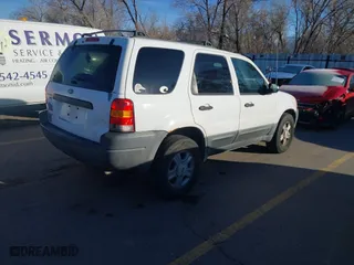 2003 Ford Escape XLT Popular with VIN 1FMYU03193KC46125, listed as a IAAI auction lot 41752254 with 186,929 mi miles. Bid and sale history available at carsss.com. Image 4.