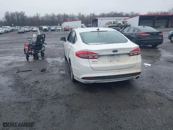 2017 Ford Fusion S with VIN 3FA6P0G77HR235084, listed as a IAAI auction lot 41582306 with 113,325 mi miles. Bid and sale history available at carsss.com. Image 3.