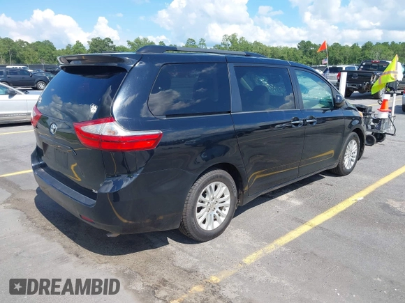 2016 Toyota Sienna XLE with VIN 5TDYK3DC8GS711357, listed as a IAAI auction lot 42525086 with 180,296 mi miles and . Bid and sale history available at DreamBid. Image 4.