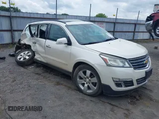 2014 Chevrolet Traverse LTZ with VIN 1GNKRJKD2EJ287211, listed as a IAAI auction lot 39873394 with 128,355 mi miles and . Bid and sale history available at DreamBid. Image 1.