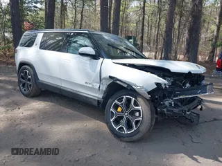 2023 Rivian R1S Launch Edition with VIN 7PDSGABL5PN006609, listed as a IAAI auction lot 41903200 with Not Provided miles. Bid and sale history available at carsss.com. Image 1.