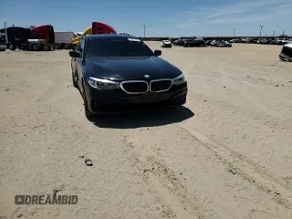 2020 BMW 5 Series 530e with VIN WBAJA9C01LCD69759, listed as a Copart auction lot 58271025 with 56,732 mi miles and Salvage title. Bid and sale history available at DreamBid. Image 13.