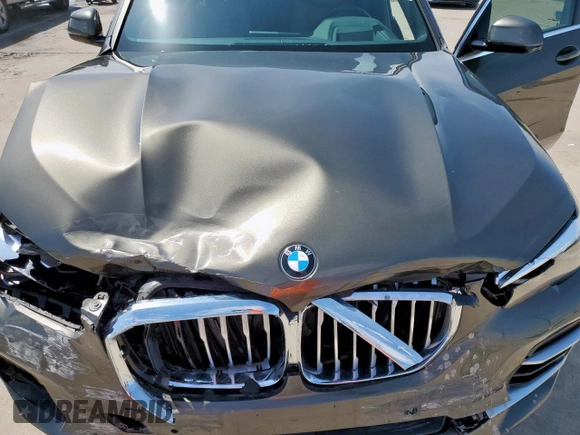 2023 BMW X5 xDrive40i with VIN 5UXCR6C01P9P27041, listed as a Copart auction lot 59009585 with 45,568 mi miles and Salvage title. Bid and sale history available at DreamBid. Image 12.