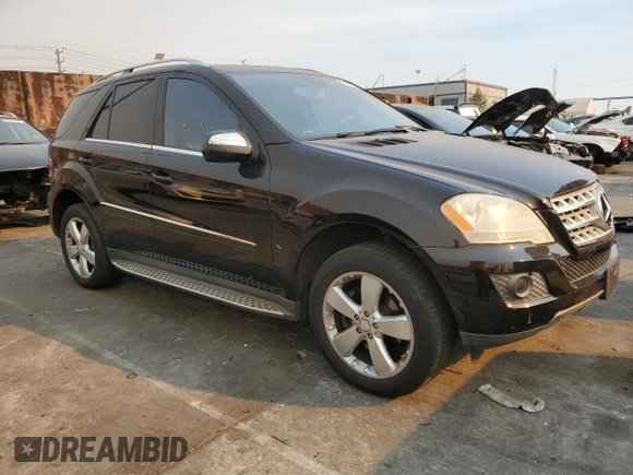 2009 Mercedes-Benz M 3.5L with VIN 4JGBB56E49A525018, listed as a Copart auction lot 41614175 with 154,428 mi miles and Salvage Title. Bid and sale history available at carsss.com. Image 4.