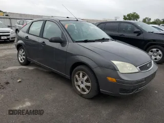 2005 Ford Focus S with VIN 3FAFP37N75R120187, listed as a Copart auction lot 57390605 with 163,547 mi miles and Salvage title. Bid and sale history available at DreamBid. Image 4.