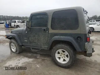 2005 Jeep Wrangler Rubicon with VIN 1J4FA69S95P377014, listed as a Copart auction lot 42676915 with 130,571 mi miles and Salvage Title. Bid and sale history available at carsss.com. Image 2.