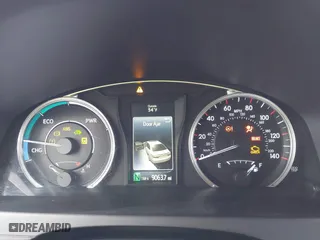 2015 Toyota Camry Hybrid LE with VIN 4T1BD1FK7FU155931, listed as a IAAI auction lot 41794523 with 90,730 mi miles. Bid and sale history available at carsss.com. Image 7.