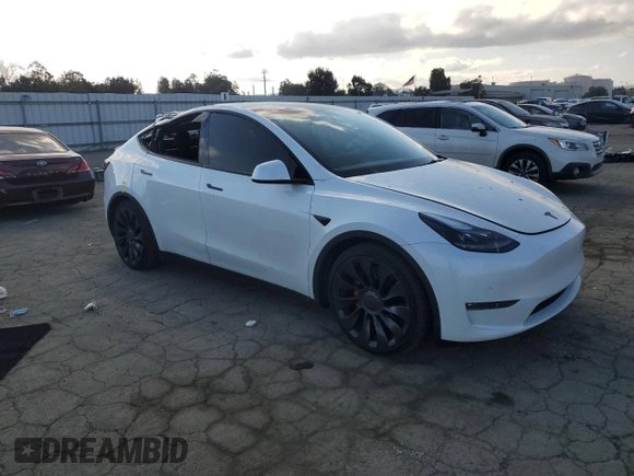 2022 Tesla Model Y Performance with VIN 7SAYGDEF1NF342071, listed as a Copart auction lot 43084905 with 30,534 mi miles and Salvage Title. Bid and sale history available at DreamBid. Image 4.