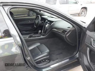 2014 Cadillac CTS Vsport Premium RWD z VIN 1G6AV5S8XE0175517, wystawiony jako IAAI lot #41126885 z przebiegiem 140 667 mil mil oraz . Historia ofert i sprzedaży dostępna na DreamBid. Obrazek 5.