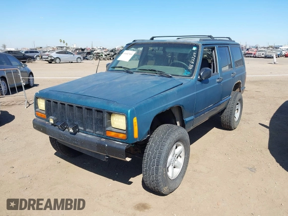 1997 Jeep Cherokee Sport with VIN 1J4FJ68S4VL592390, listed as a IAAI auction lot 41682369 with 194,624 mi miles. Bid and sale history available at carsss.com. Image 6.