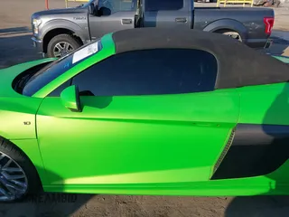 2017 Audi R8 z VIN WUAVACFX5H7903923, wystawiony jako IAAI lot #41348191 z przebiegiem 53 883 mil mil oraz . Historia ofert i sprzedaży dostępna na DreamBid. Obrazek 14.