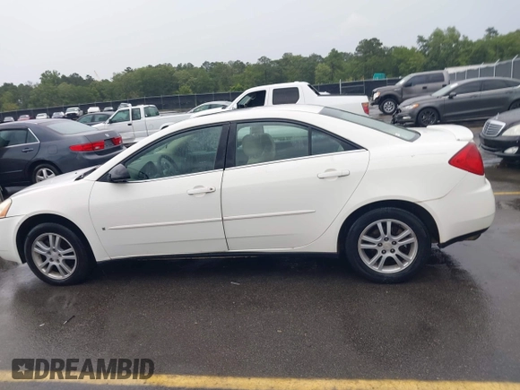 2006 Pontiac G6 6-Cyl z VIN 1G2ZG558364172091, wystawiony jako IAAI lot #42377332 z przebiegiem 199 495 mil mil oraz . Historia ofert i sprzedaży dostępna na DreamBid. Obrazek 14.