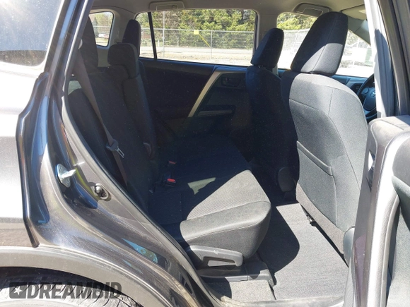 2016 Toyota RAV4 LE with VIN JTMZFREV5GJ078051, listed as a IAAI auction lot 41858381 with 97,032 mi miles and . Bid and sale history available at DreamBid. Image 8.