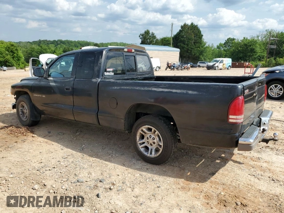 2001 Dodge Dakota z VIN 1B7GL22X81S204868, wystawiony jako Copart lot #57178895 z przebiegiem 298 667 mil mil oraz Szkoda całkowita • Salvage title. Historia ofert i sprzedaży dostępna na DreamBid. Obrazek 2.