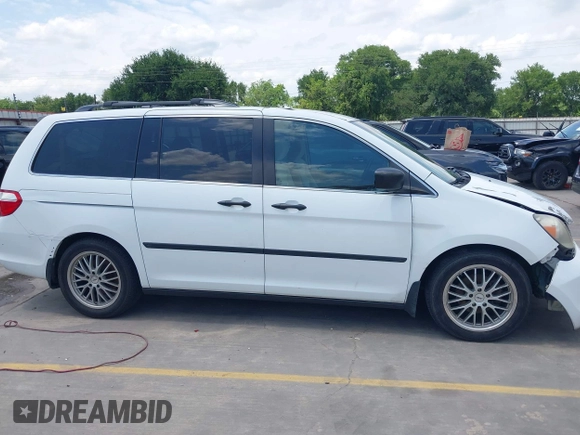 2007 Honda Odyssey LX with VIN 5FNRL382X7B135892, listed as a IAAI auction lot 42223231 with 204,054 mi miles and . Bid and sale history available at DreamBid. Image 14.