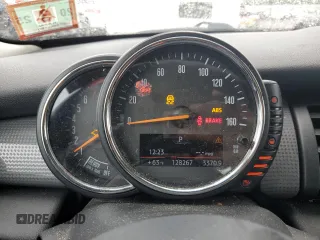 2016 MINI Hardtop 4 Door with VIN WMWXU1C53G2D08231, listed as a Copart auction lot 61050035 with 128,267 mi miles and Salvage title. Bid and sale history available at DreamBid. Image 9.