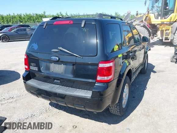 2012 Ford Escape XLT z VIN 1FMCU9D76CKC59030, wystawiony jako IAAI lot #42396412 z przebiegiem 101 223 mil mil oraz . Historia ofert i sprzedaży dostępna na DreamBid. Obrazek 4.