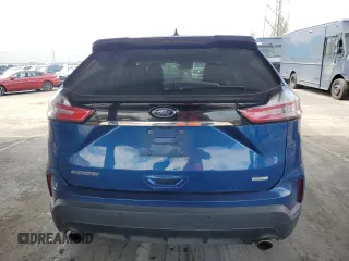 2020 Ford Edge SE z VIN 2FMPK3G99LBA14363, wystawiony jako Copart lot #52831575 z przebiegiem 122 382 mil mil oraz Tytuł czysty. Historia ofert i sprzedaży dostępna na DreamBid. Obrazek 6.