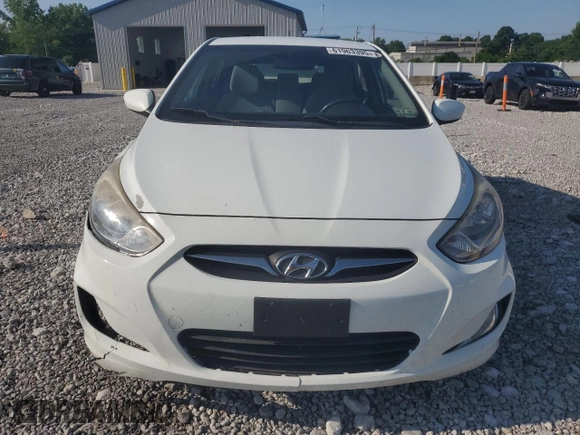 2012 Hyundai Accent SE with VIN KMHCU5AE4CU009351, listed as a Copart auction lot 61963395 with 138,384 mi miles and Clean title. Bid and sale history available at DreamBid. Image 5.