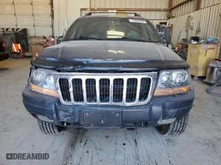 2001 Jeep Grand Cherokee Laredo with VIN 1J4GW48N41C557380, listed as a Copart auction lot 74080604 with 58,005 mi miles and Salvage Title. Bid and sale history available at carsss.com. Image 5.