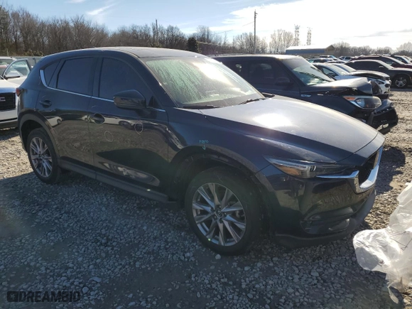 2019 Mazda CX-5 Grand Touring with VIN JM3KFADM9K1646278, listed as a Copart auction lot 88667245 with NaN miles and Salvage Title. Bid and sale history available at carsss.com. Image 4.
