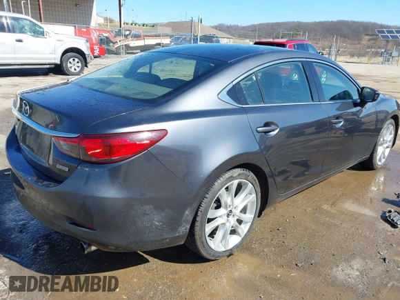 2016 Mazda Mazda6 i Touring with VIN JM1GJ1V57G1460363, listed as a IAAI auction lot 41742896 with 145,819 mi miles. Bid and sale history available at carsss.com. Image 4.