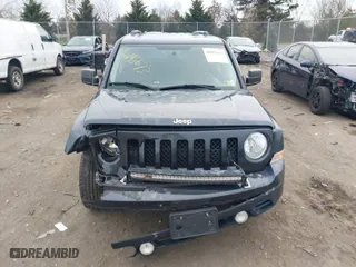 2016 Jeep Patriot Latitude with VIN 1C4NJRFBXGD524016, listed as a IAAI auction lot 40895673 with 157,465 mi miles. Bid and sale history available at carsss.com. Image 12.