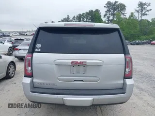 2015 GMC Yukon XL SLT with VIN 1GKS1HKC2FR251672, listed as a IAAI auction lot 42152312 with 232,736 mi miles and . Bid and sale history available at carsss.com. Image 16.