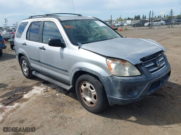 2005 Honda CR-V LX with VIN JHLRD68565C015724, listed as a IAAI auction lot 42021737 with 207,142 mi miles. Bid and sale history available at carsss.com. Image 1.