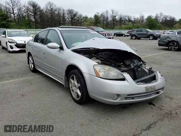 2003 Nissan Altima SE z VIN 1N4BL11EX3C227429, wystawiony jako Copart lot #56659075 z przebiegiem Nie podano mil oraz Szkoda całkowita • Salvage title. Historia ofert i sprzedaży dostępna na DreamBid. Obrazek 13.