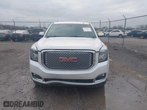2016 GMC Yukon XL Denali with VIN 1GKS2HKJ9GR264481, listed as a IAAI auction lot 41764272 with 114,852 mi miles. Bid and sale history available at carsss.com. Image 12.