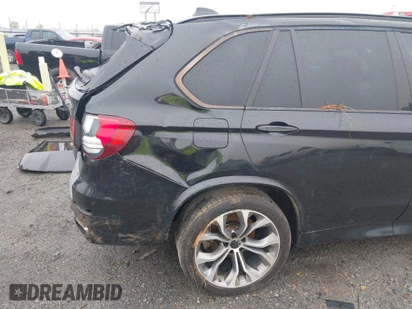 2015 BMW X5 xDrive50i z VIN 5UXKR6C56F0J78575, wystawiony jako IAAI lot #41933018 z przebiegiem Nie podano mil oraz . Historia ofert i sprzedaży dostępna na DreamBid. Obrazek 21.